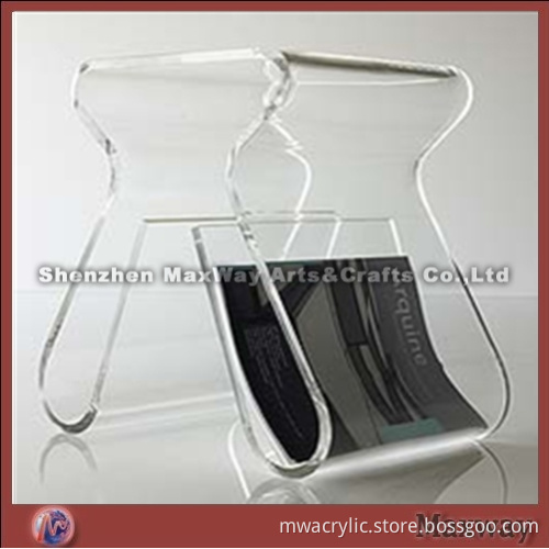 Clear acrylic/perspex coffee table with magazine holder